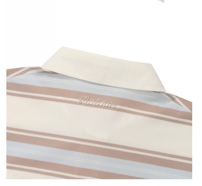 Malbon striped golf polo cuff close-up