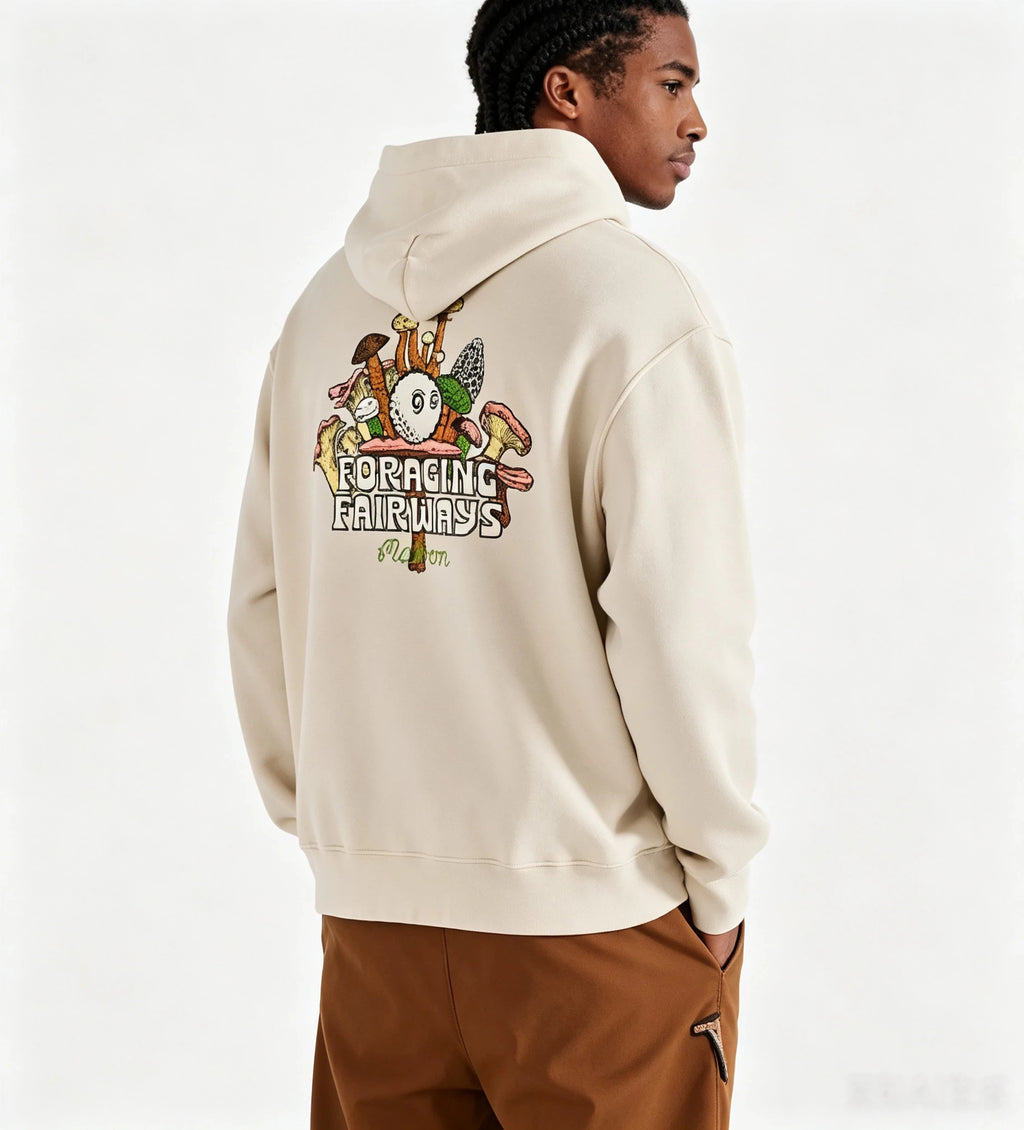 Model wearing Malbon beige heavyweight hoodie back view