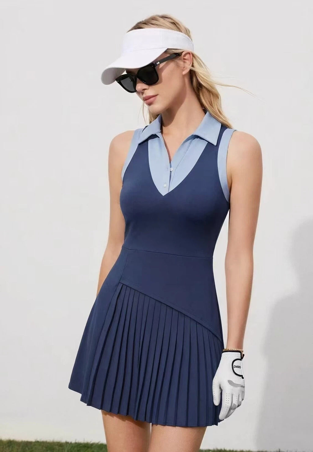 OZERO Navy high-waist golf dress side view on model