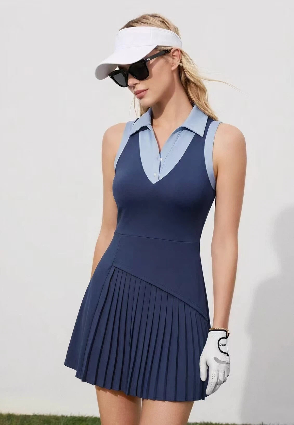 OZERO Navy high-waist golf dress side view on model
