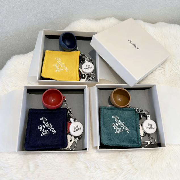 Malbon Golf Towel & Keychain Gift Set 2026 — lifestyle on the course