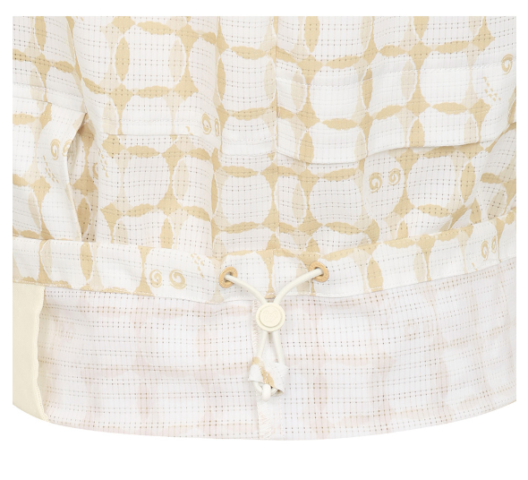 Malbon women's mesh breathable half-zip golf vest in Beige, lifestyle view