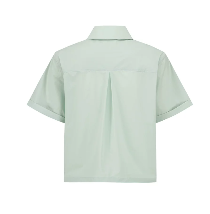 Malbon women's mint green utility golf shirt back view