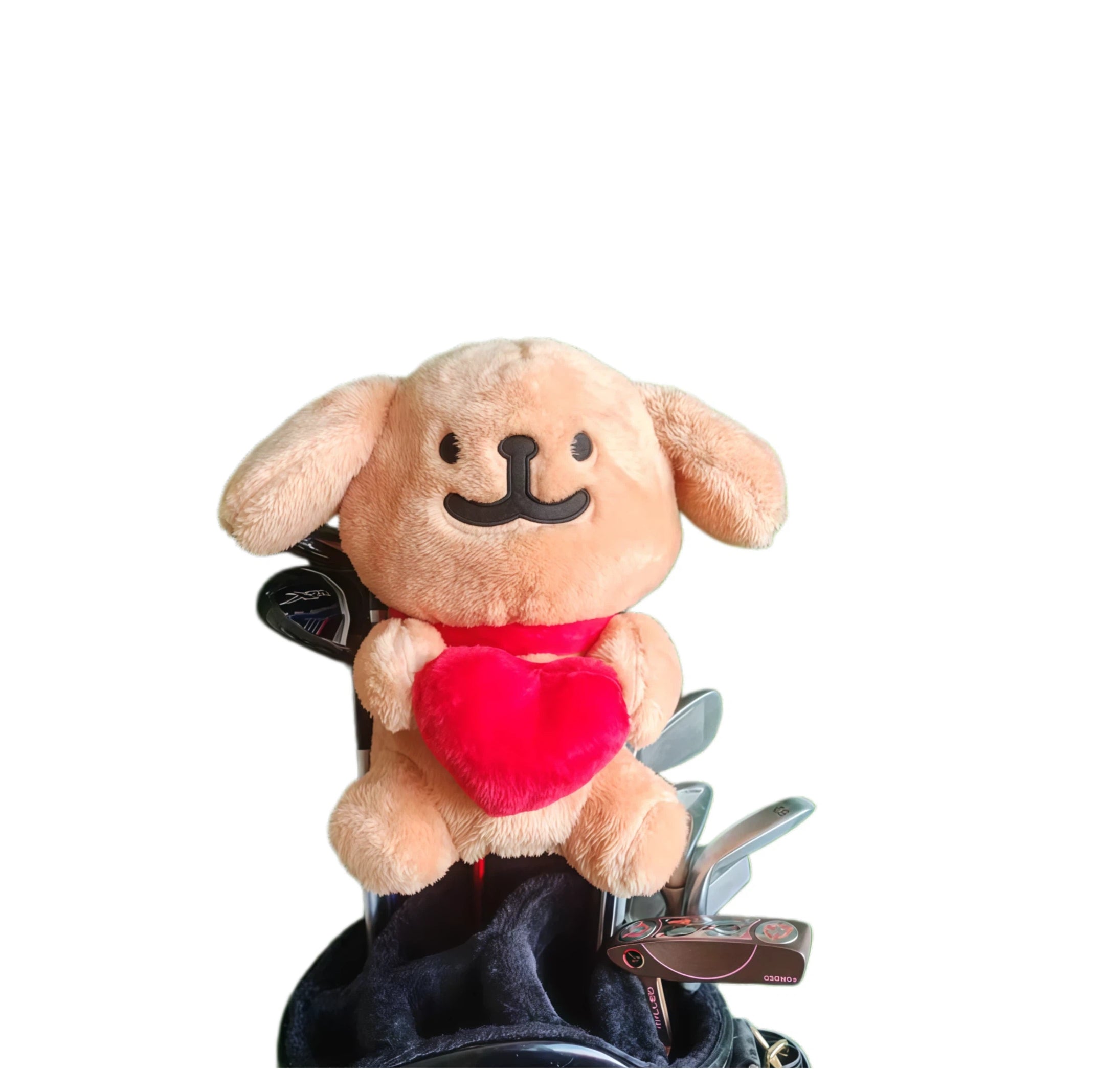 Plush dog toy with a red heart on a white background