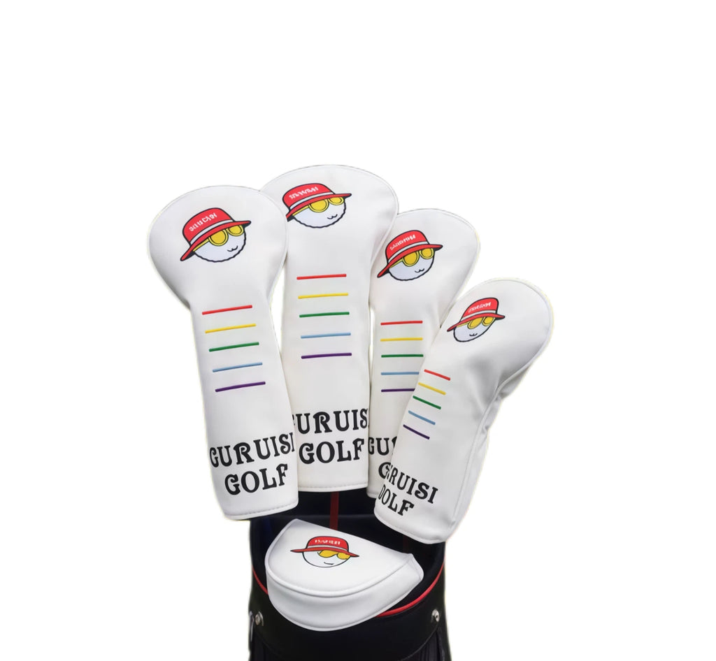 White GURUISI GOLF headcover set featuring cartoon character with red hat and yellow sunglasses, plus vertical rainbow stripes; includes driver, fairway woods, and putter cover — displayed in golf bag for full-set visualization.