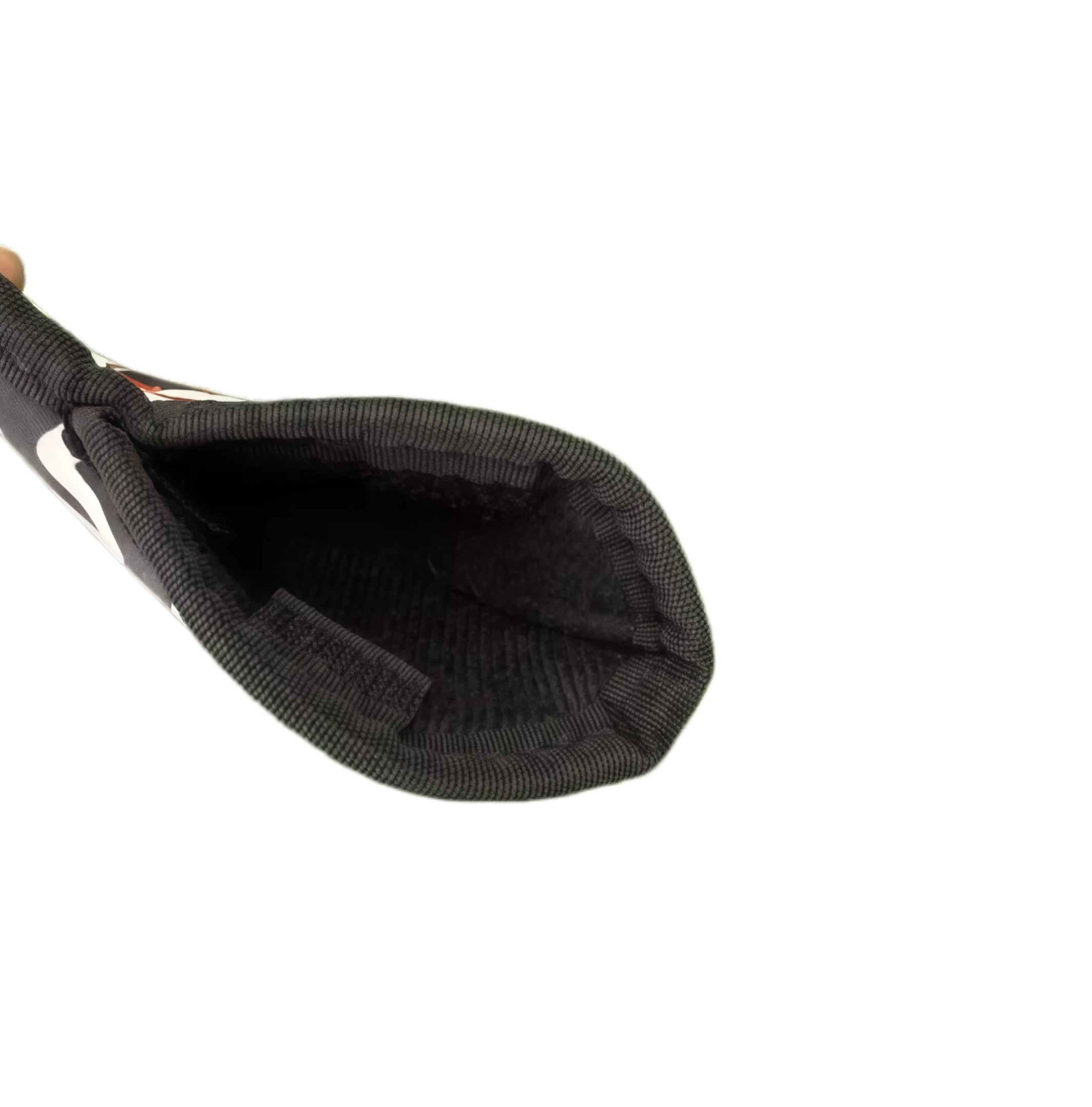 Interior view of MU cartoon print golf iron cover revealing soft black lining and durable nylon construction, ensuring protection for sand and wedge clubs against scratches and impacts.
