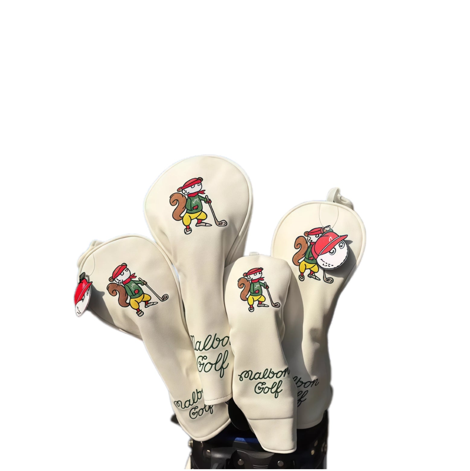 Malbon Caddie Embroidered Golf Headcovers Set in off-white featuring embroidered cartoon squirrel caddie and dark green "Malbon Golf" lettering - includes full set for driver, fairway, iron, and putter with magnetic closure for secure fit