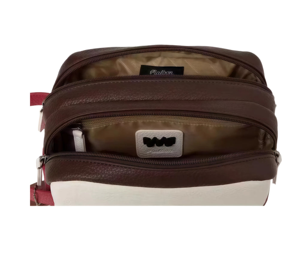 Open view of the Malbon clutch revealing two zippered compartments, internal organizer pockets, and a branded leather patch with a stylized "M" logo. Practical storage solution for essentials.