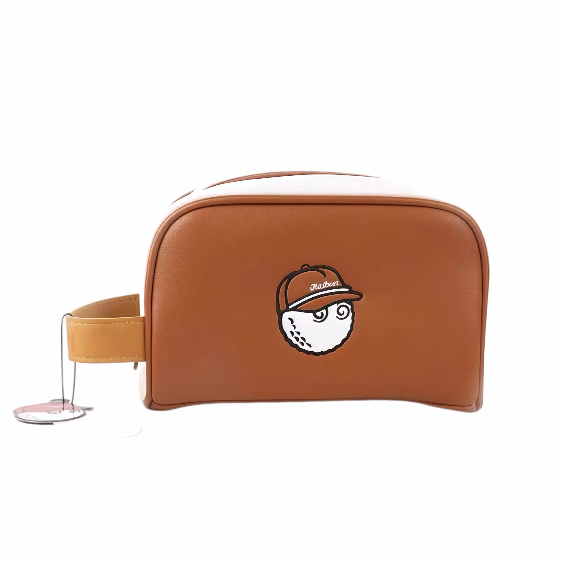 Front view of Malbon Golf Buckets pouch in tan PU leather featuring embroidered cartoon golf ball wearing a cap with "Malbon" text, white trim, and tan leather handle with brand tag