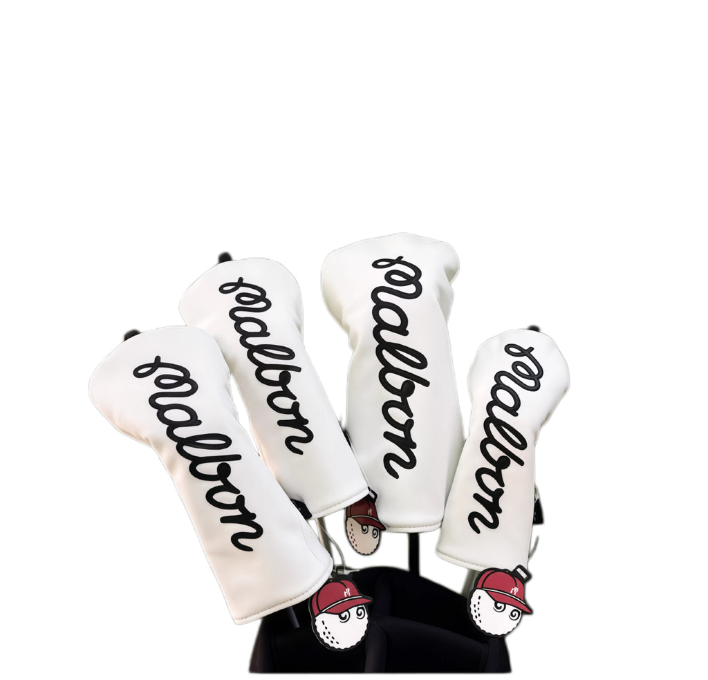 Set of golf club head covers with 'salomon' branding on a white background