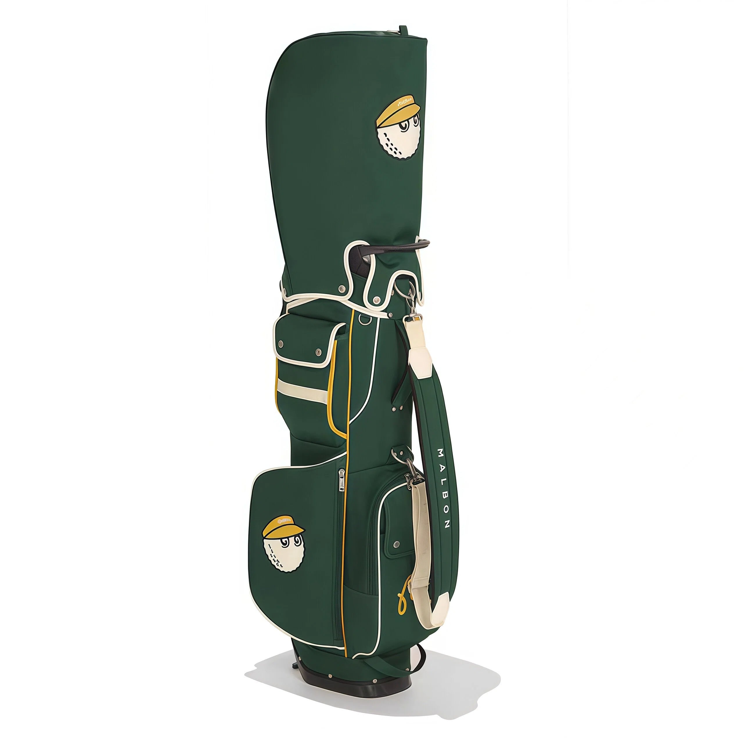 Side profile of Malbon Golf stand bag in dark green with gold-trimmed pocket, cartoon golf ball wearing cap, and "MALBON" lettering on shoulder strap.
