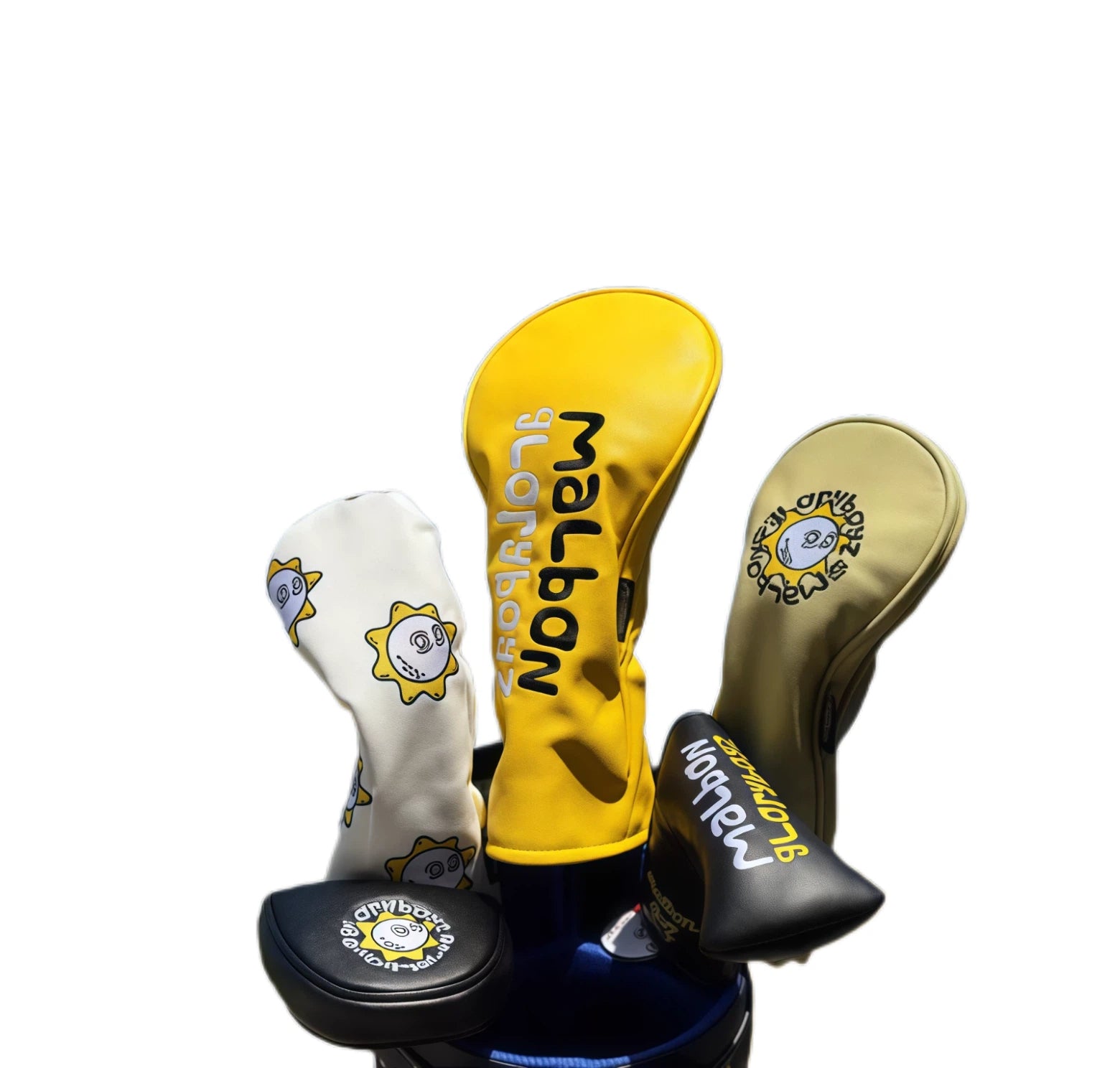 Complete Malbon Golf sunflower headcover set including white, yellow, beige, and black mallet putter covers with smiling sun prints and "Malbon" branding — stylish, unisex golf club protection with a joyful design.

