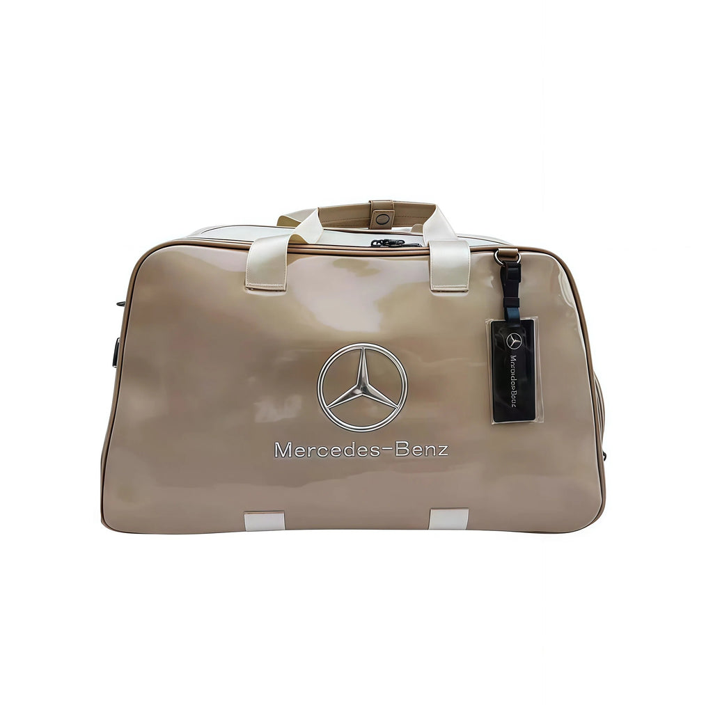Front view of the beige Mercedes-Benz glossy duffel bag showcasing the chrome logo, "Mercedes-Benz" text, and clean design. A sophisticated lifestyle accessory.
