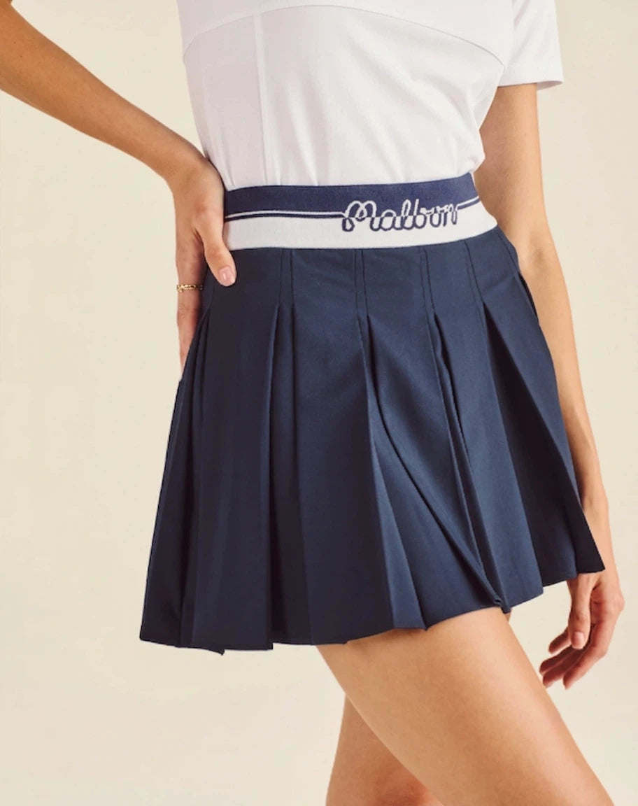 Malbon Studio Seoul Logo Banding Pleated Skirt Navy Blue pleated golf skirt detail view