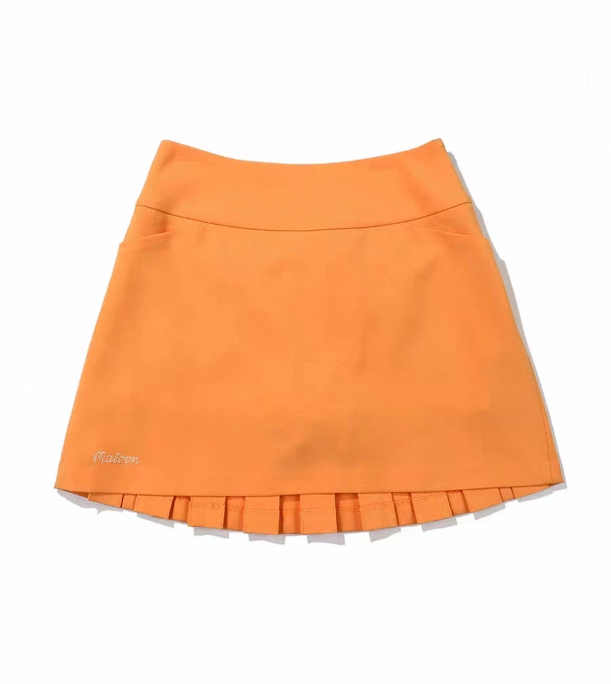 Malbon Women's Logo Pleated Golf Skort Orange pleated golf skort front view