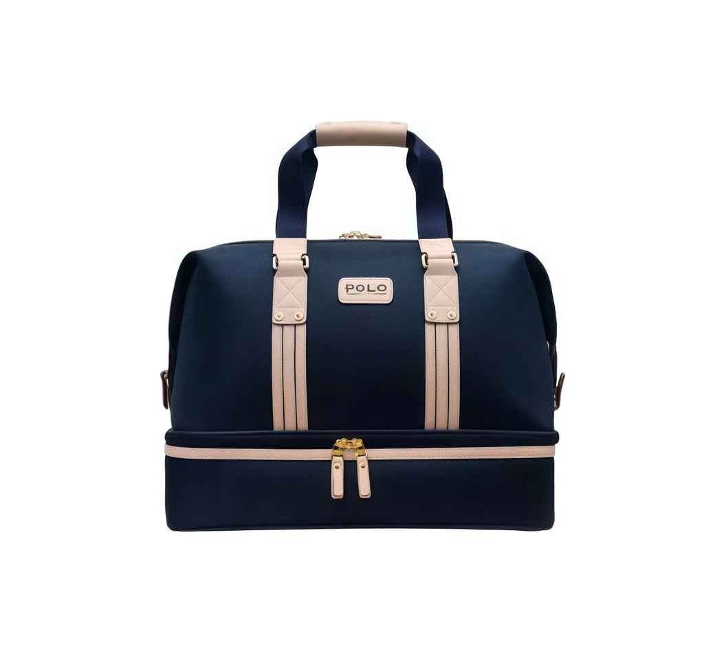Front view of the Polo Golf Dual-Zip Duffel Bag in navy blue with beige trim, featuring dual-zip compartments, reinforced handles, and a "POLO" logo plaque. Ideal for golf, travel, or weekend trips.