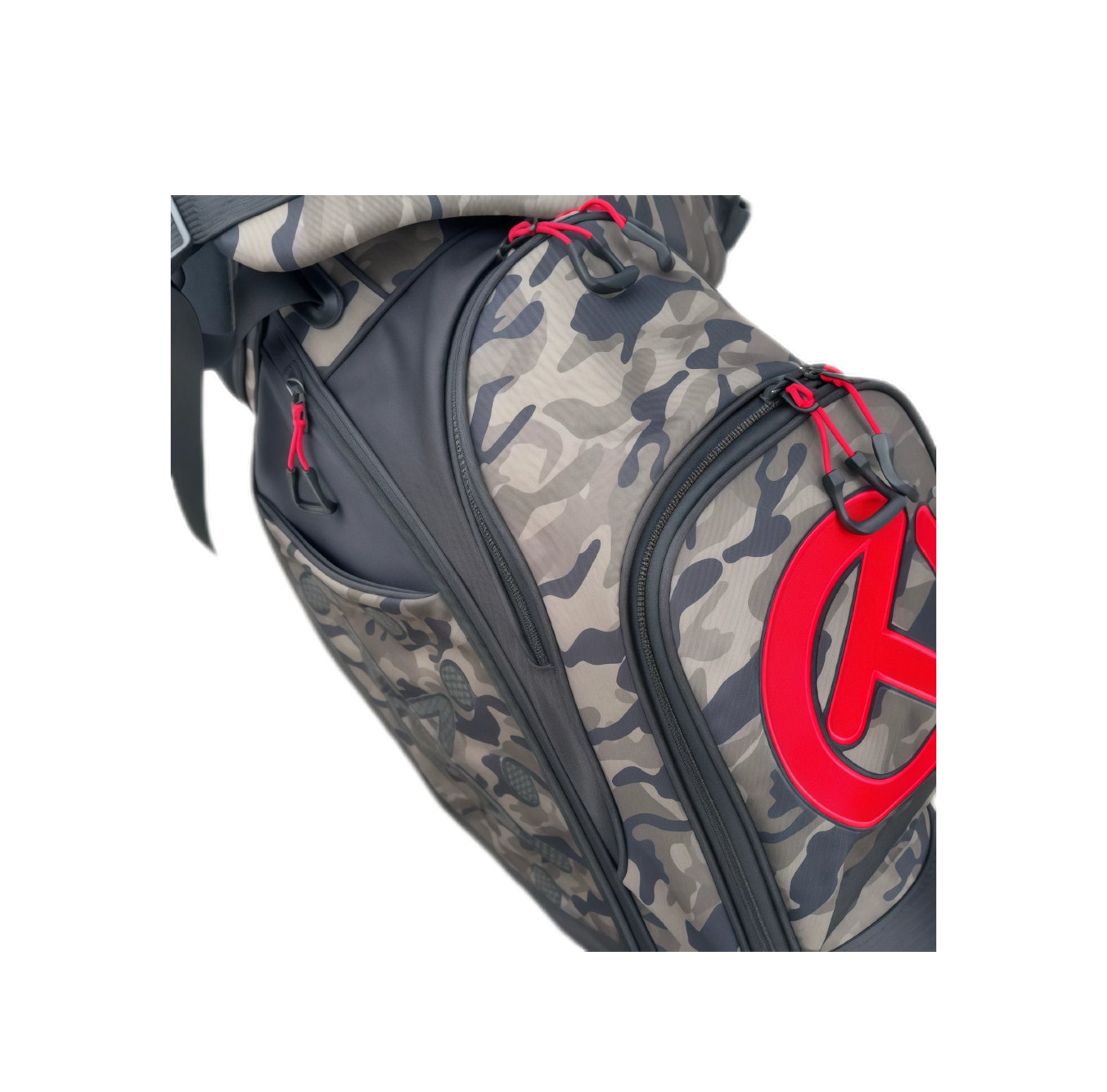 Detailed view of the Scotty Cameron Junior Camo-Red Stand Bag’s side pocket, featuring red zipper pulls, camouflage texture, and the prominent red Circle T logo on the pocket flap.