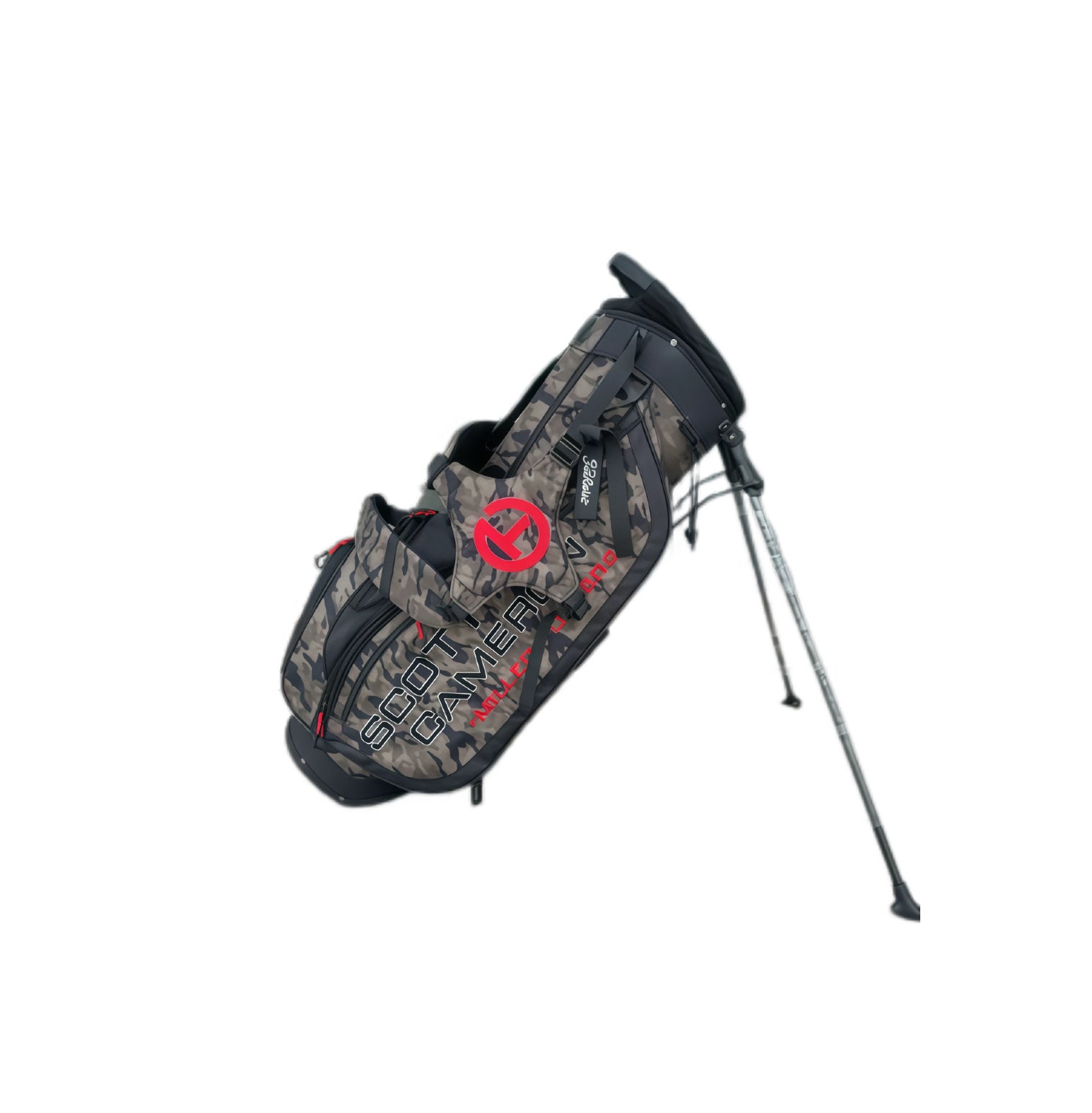 Angled view of the Scotty Cameron Junior Camo-Red Circle T Stand Bag, featuring a camouflage pattern with a bold red Circle T logo and black accents, displayed with its stand legs extended on a white background.