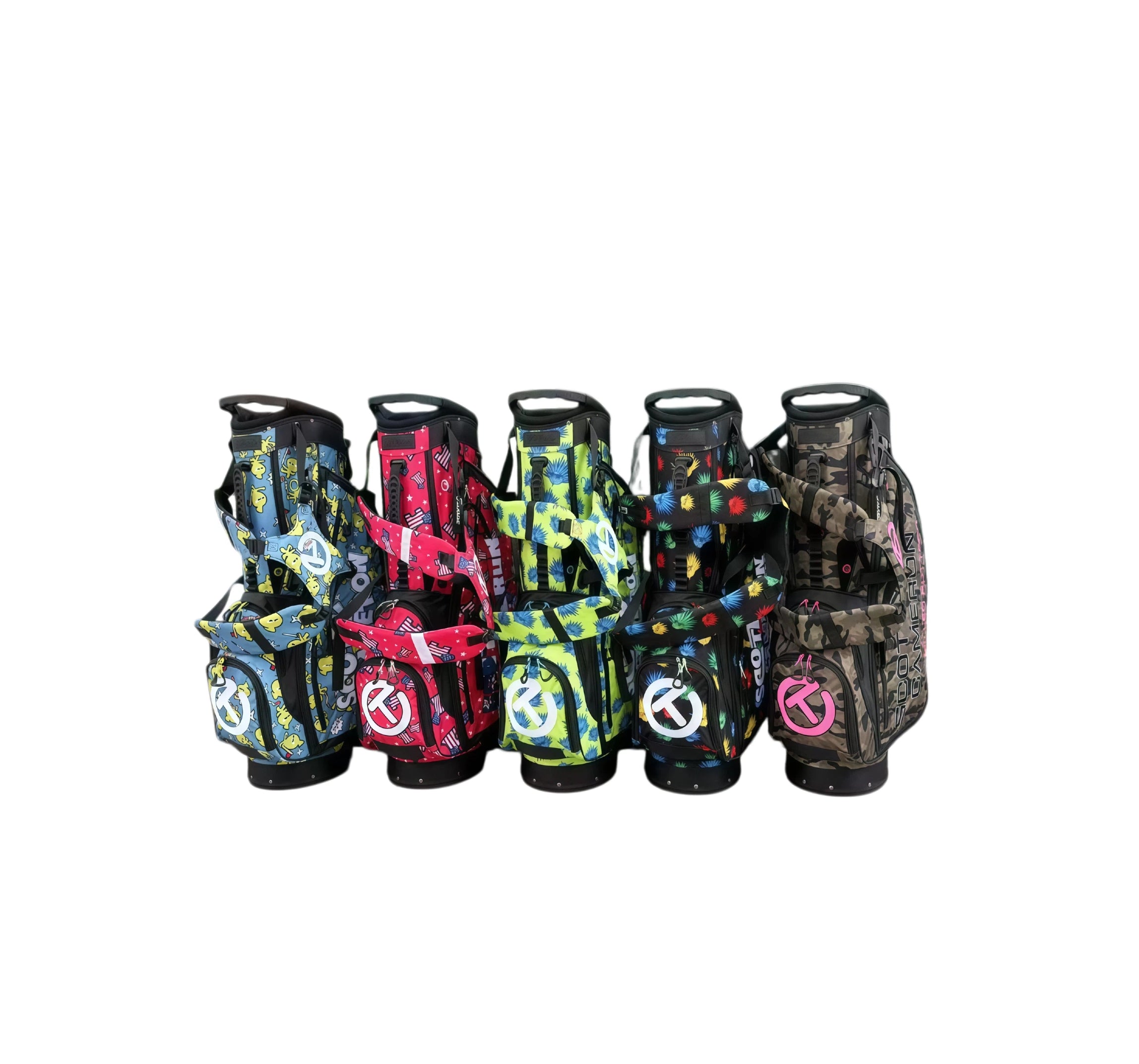 A front view of five Scotty Cameron Pathfinder stand bags lined up. The collection showcases various exclusive prints, including the black Agave Man, a camouflage pattern, and others with chick and patriotic themes.