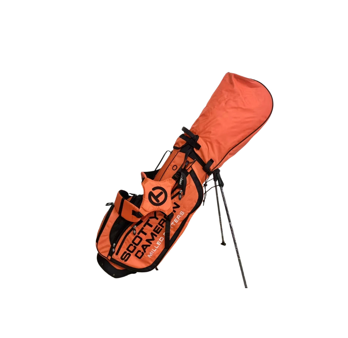Front view of the Scotty Cameron Scottydog Stand Bag in Orange, featuring the Circle T logo, "SCOTTY CAMERON MILLED PUTTERS" text, and black accents on a sleek, lightweight design.