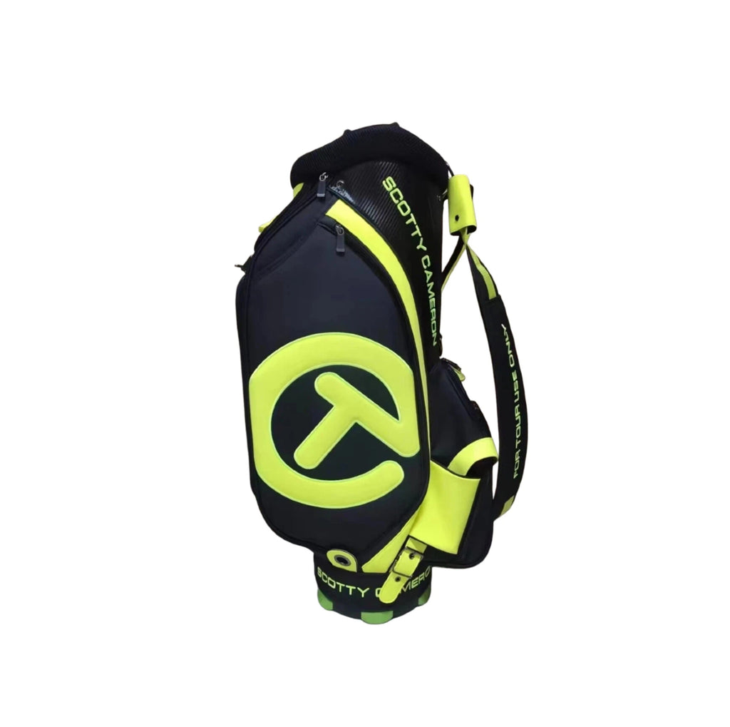 Front-facing view of the Scotty Cameron Staff Bag 2022 Tour Bag, emphasizing the oversized neon yellow Circle T logo and “SCOTTY CAMERON” lettering on a charcoal background.