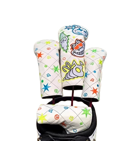 Six-Star Mage golf headcovers set featuring white base with colorful stars, wizard hat, owl and magic wand embroidery, compatible with driver, fairway woods and putter for stylish protection.