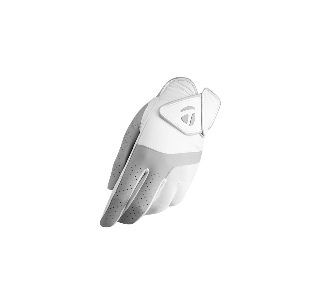 Angled view of the TaylorMade Kalea N77030 women's golf glove, highlighting its contoured fit, flexible construction, and secure wrist strap for all-day comfort on the course.