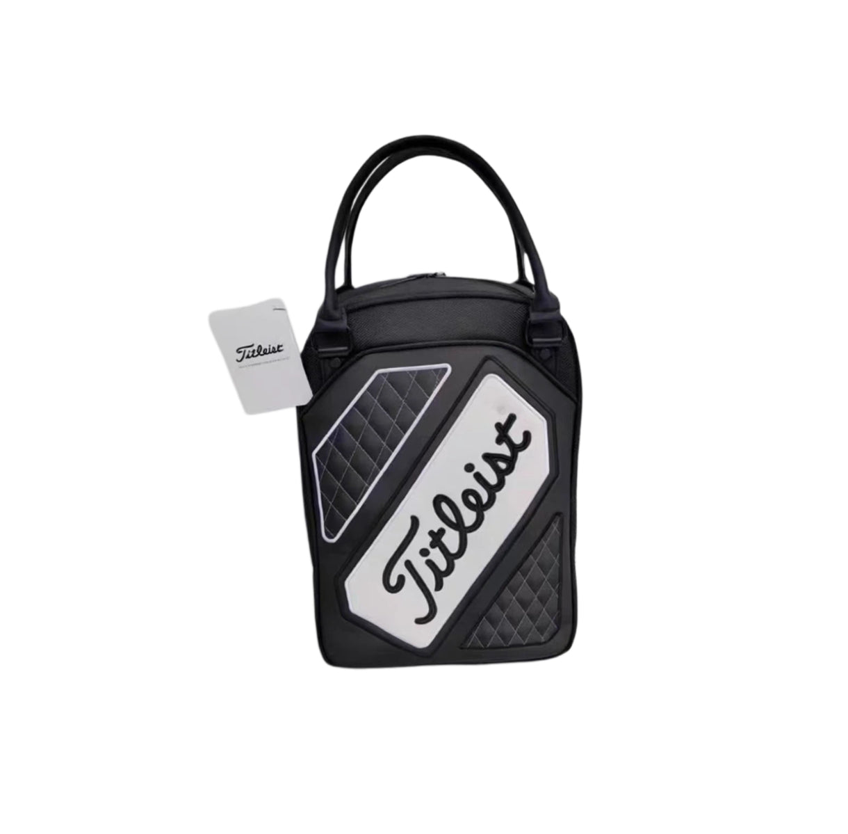 White version of the Titleist Quilted Golf Tote Bag showcasing a clean white logo panel with black "Titleist" script, quilted side panels, dual handles, and attached brand tag. Perfect for golfers seeking elegance and function.
