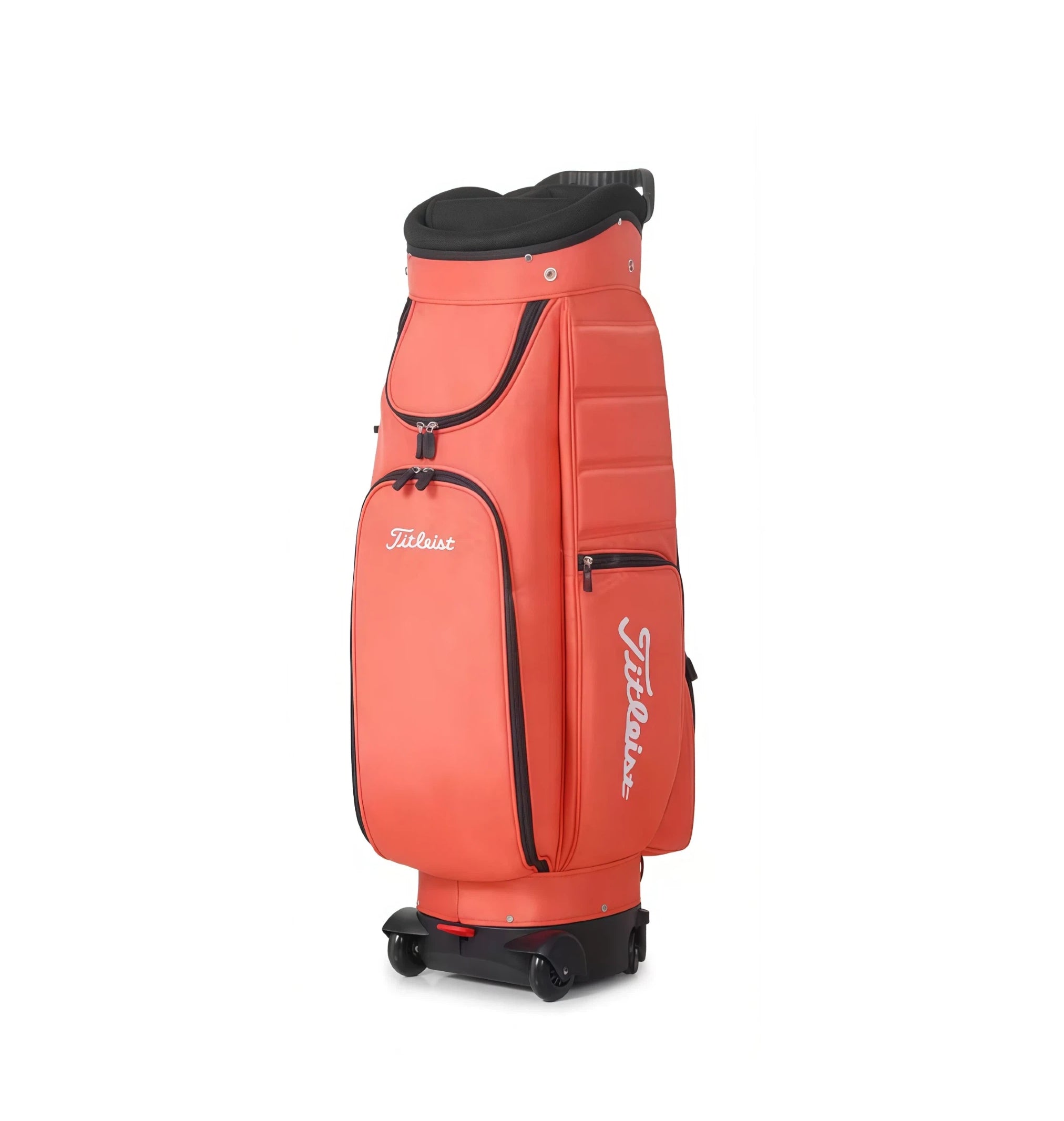 Front view of the Titleist Travel Trolley Bag in coral red, showcasing its sleek design, black trim, and integrated wheel system. Features "Titleist" logo and ergonomic structure for comfortable travel.