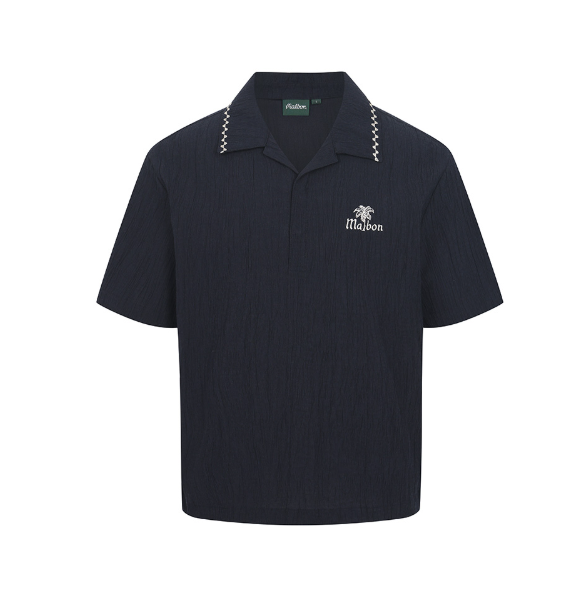 Malbon men's textured quick-dry lightweight golf polo in Navy Blue - front view