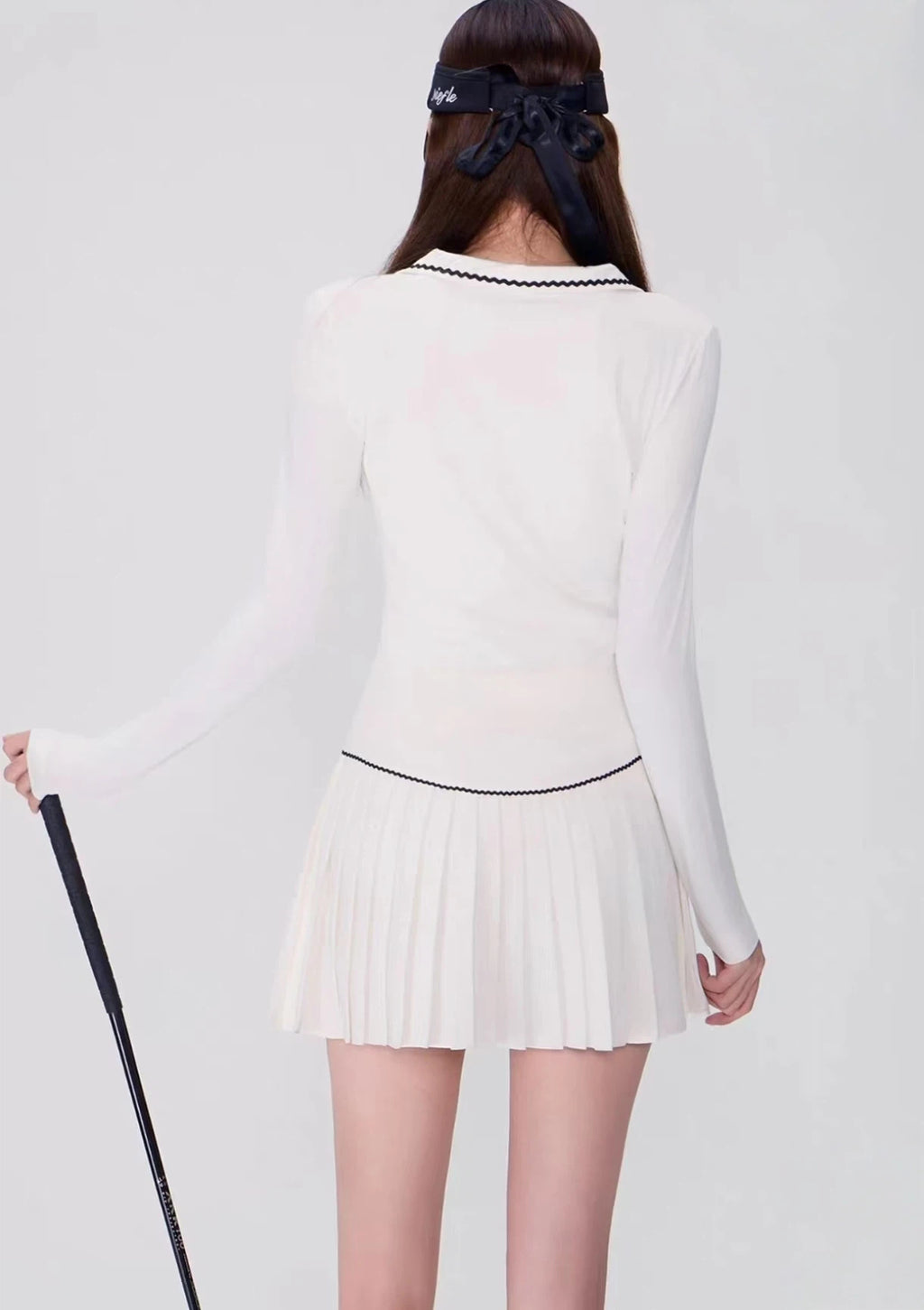 OZERO White golf shirt and skirt set side view on model