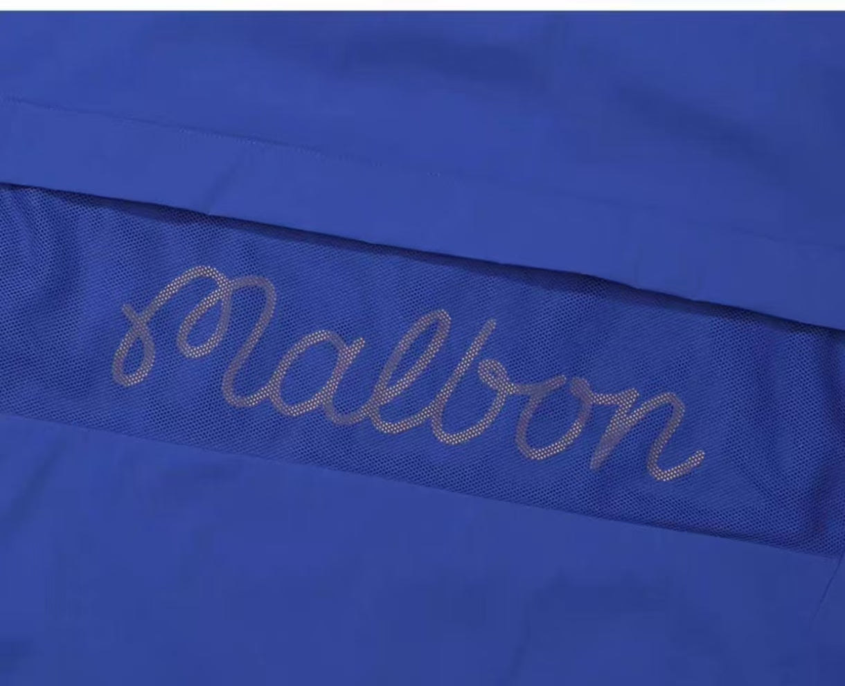 Malbon Unisex Quarter-Zip Golf Polo Shirt Blue quarter zip golf polo shirt collar and logo detail