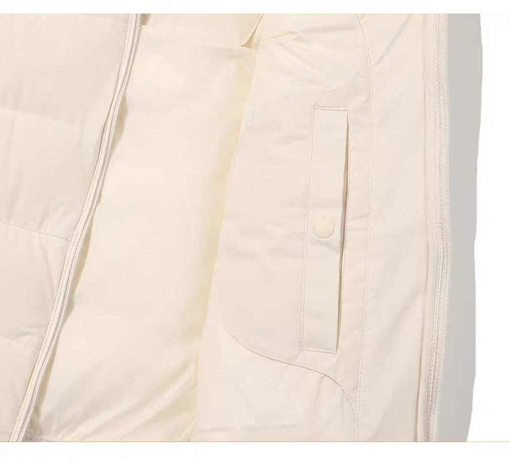 Malbon Golf Women’s Premium Duck Down Insulated Vest beige zip and pocket detail