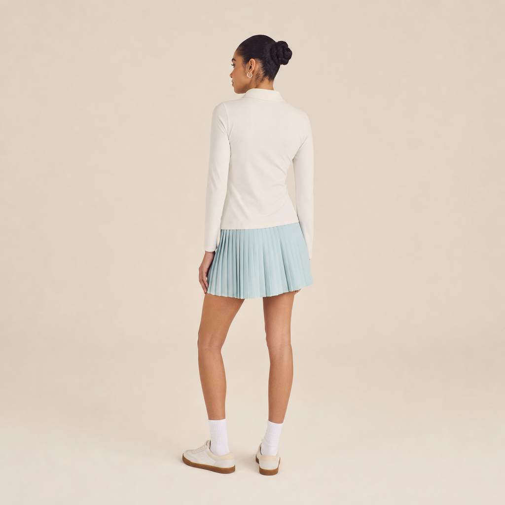 Malbon Venus Long Sleeve Polo White lifestyle shot